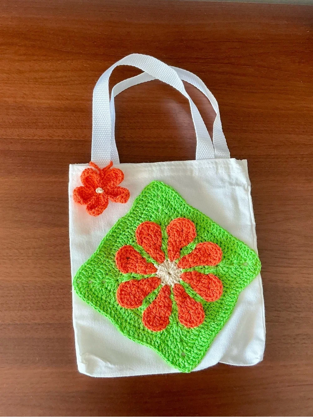 Small White Canvas Tote with Green & Orange Crochet Flower Accent